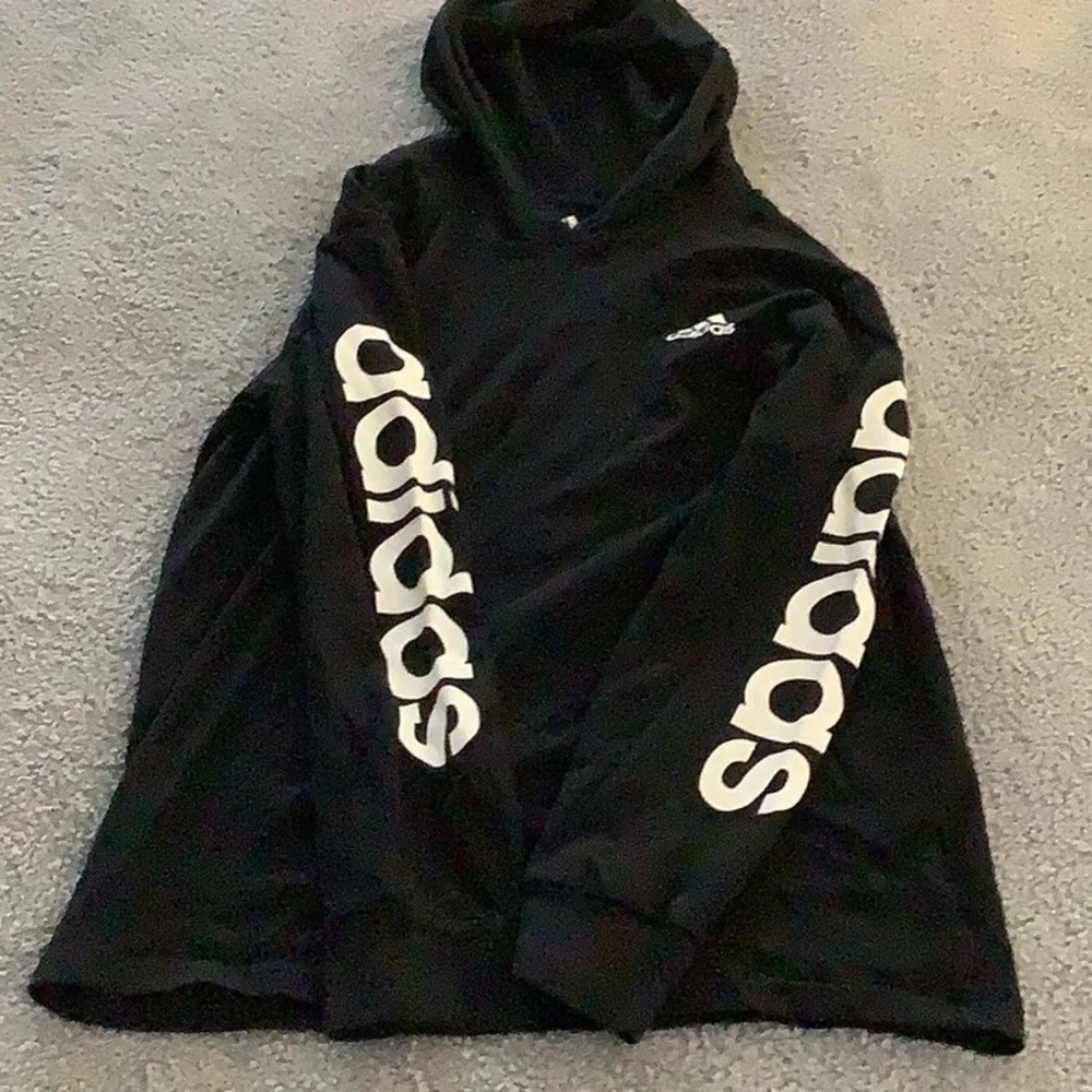 Adidas youth size medium 10/12 black and white long sleeve hooded tee.